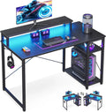 40-Inch Gaming Desk with LED Lights, Storage Shelf & Monitor Stand - Compact Carbon Fiber Design